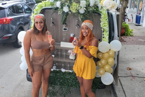 two-women-enjoying-mobile-cocktails-summer-2021